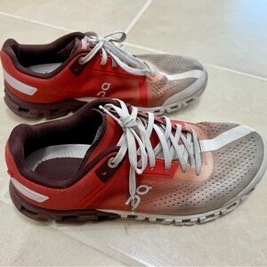On Running Red and White Athletic Shoes with Cushioned Midsole